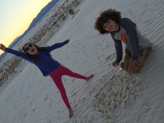 White Sands playing with gypsum sand